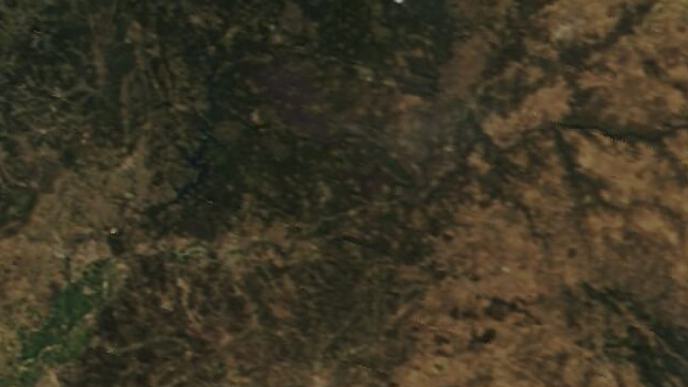 Imagen de satélite de la zona del incendio de verão de 2003 (nisa / mação e chamusca) antes y después del fuego